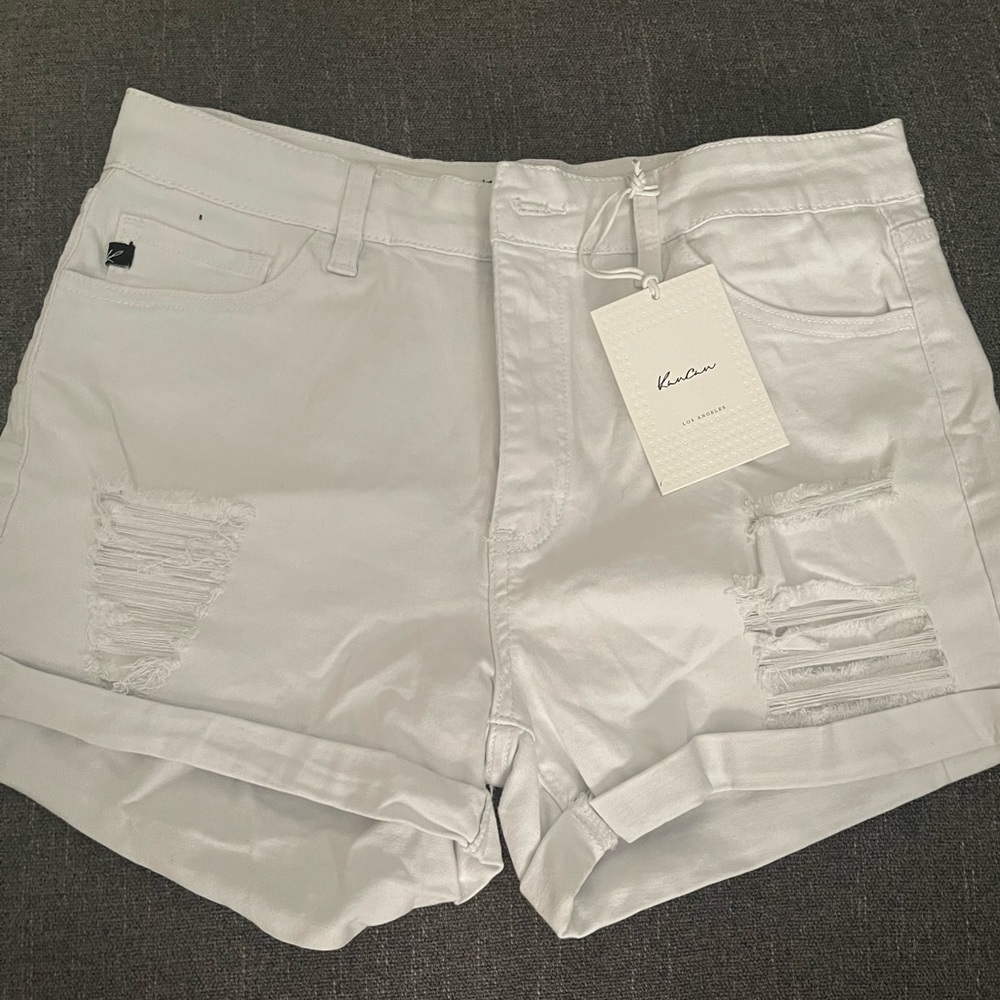 White distressed shorts